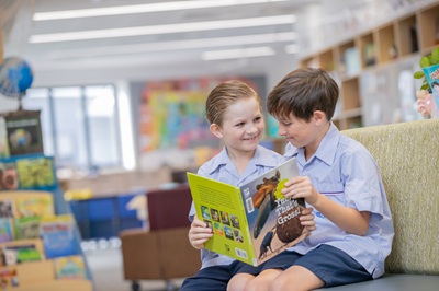Boys reading in the library
